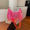 Bolsa de Gelatina de PVC Transparente para Mujer 2026 Nueva Bolsa de Hombro Cruzado Color Caramelo Bolso de Axila de Moda Bolso Versátil de Personalidad
