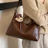Bolso de axila de estilo francés de alta gama transfronterizo, nuevo y moderno y elegante bolso HOBO, bolso de hombro versátil, venta al por mayor