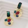 Aretes geométricos retro irregulares de color con esmalte de gota 2023 nuevos aretes de nicho de temperamento de alta gama para mujer