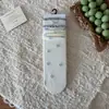 Calcetines de altura media con estampado floral y lazo de burbuja estilo coreano Peiqiao, dulces y femeninos, calcetines sin costuras de algodón puro, venta al por mayor de la industria del calcetín de Zhuji