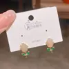Pendientes populares europeos y americanos de hoja de tulipán verde con piedras de zirconia completas, postes de plata, a la moda y versátiles, pendientes elegantes y de alta gama