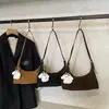 Bolso tipo bandolera popular este año, bolsa tipo dumpling para mujer, nuevo para el invierno 2025, ropa casual versátil para el trabajo, bolso retro de un solo hombro cruzado