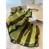 Conjunto de Pijama Camisola Listrado Verde de Seda de Gelo para Mulheres 2026 Novo Estilo Shorts de Cetim com Sensação Fresca Conjunto de Roupa para Casa Roupa Externa