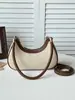Bolso de mujer de venta caliente transfronterizo 2026 nuevo diseño de moda versátil bandolera tipo dumplings bolso de hombro tejido simple para debajo del brazo para mujer