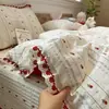 Juego de ropa de cama de cuatro piezas de gasa doble, fresco y sencillo, popular en línea, funda de edredón de encaje de algodón puro, falda de cama, colcha jacquard teñida en hilo, estilo sábana ajustable