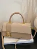 Bolso cuadrado pequeño retro de estilo coreano, moderno y único, para mujer, adecuado para ir al trabajo, con un distintivo toque casual y de alta gama, nuevo modelo cruzado y de mano