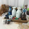 Comercio exterior fábrica personalizada mayoreo cerámica estilo japonés jarra para calentar vino cálida jarra para vino transparente medio jin dos liang licor sake separador de vino