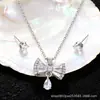 Cdd Zirconia Incrustada en Cobre Estilo Europeo y Americano Moda Cadena para Clavícula Joyería de Lujo Ligero Set de Aretes y Collar de Gama Alta para Mujeres Directo de Fábrica