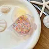 Adorno pequeño de pez marino acrílico, llavero de pez de océano, colgante creativo de botella de arena líquida de pez payaso, decoración de bolsa al por mayor