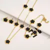 Comercio electrónico transfronterizo trébol de la suerte de cinco hojas pétalo de doble cara collar de oro pendientes pulsera collar traje de joyería para mujer venta al por mayor