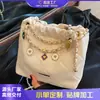 Bolso de Cadena con Patrón de Diamantes para Mujer 2026 Nuevo Diseño de Nicho Bolso de Hombro Cruzado Estilo Popular de Celebridad de Internet Bolso Cubo de Gama Alta