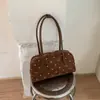 Bolso de hombro de moda estilo coreano Ruien con lunares 2026 otoño nuevo de gran capacidad para el trabajo bolso Boston exquisito