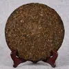 Pastel de té Pu'er al por mayor Té Pu'er té cocido 357G Pastel cocido Banzhang Yema dorada Pastel de siete semillas de Yunnan Té Negro