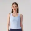 Nova regata estilosa sem mangas, corte justo para mulheres, peça íntima sem costura, lindo design nas costas, justa ao corpo, versátil para fitness e yoga