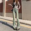 Comercio transfronterizo nuevo estilo 2025 adelgazantes amarillo-marrón microcampana jeans mujer campana chica hot largo hasta el suelo primavera verano