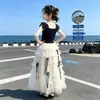 Traje de Falda para Niña Verano 2026 Nuevo Estilo Falda de Gasa Hinchada Infantil Dulce Sin Mangas Estilo Princesa Conjunto de Dos Piezas Moderno