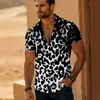 Camisa europea y americana transfronteriza para hombre con estampado de leopardo, moda callejera de verano, camisa de manga corta de alta gama para hombre, envío directo de una pieza