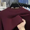 Suéter de cuello alto cruzado al por mayor para hombre, nuevo estilo otoño e invierno 2026, camiseta básica de punto versátil de color liso para hombres de mediana edad