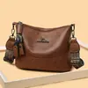 Bolso de cubo simple y versátil, estilo transfronterizo, bolso de hombro de alta calidad, bolso cruzado lujoso y elegante, bolso de mamá vintage de múltiples capas