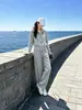 Nuevo traje deportivo casual de estilo coreano en color gris para mujer para otoño, moderno y juvenil, conjunto de dos piezas con chaqueta elegante y pantalones de pierna ancha