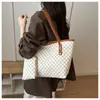 Bolso tote de gran capacidad para mujer, nuevo diseño versátil de nicho, bolso de hombro único para mujer, bolso de trabajo, bolso de mano de moda para dama