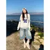 Jeans Cropped Azul Claro de Perna Larga Estilo Americano para Mulheres, Tendência Versátil para Primavera e Verão, Novos Shorts Retos Soltos Emagrecedores