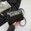 Bolsa de Cor Sólida para Mulheres 2026 Novo Modelo Bolsa Transversal de PU Design de Nicho Bolsa de Mão de Luxo de Alta Qualidade Bolsa Quadrada Pequena