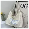 Bolsa Tote de Gran Capacidad Coreana para Mujer 2026 Nueva Bolsa de Lona Literaria Bolso de Hombro para Estudiante Clase Trabajo Ropa