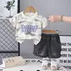 Moda Infantil Comércio Exterior Conjunto de Manga Curta 2026 Nova Roupa de Verão Conjunto Casual de Shorts de Manga Curta para Crianças Pequenas e Médias