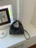 Bolso de mano nuevo de moda con lazo transfronterizo para mujer, versión coreana estilo ins de bolsa de albóndiga para salir, bolso de hombro cruzado único