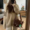 Suéter tipo abrigo de estilo coreano de estilo holgazán para mujer, otoño e invierno, nuevo, grueso, holgado, que combina con todo, que reduce la edad, casual, de punto, tipo cárdigan, top