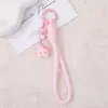 Alça de celular gatinho KT estrela de cinco pontas em desenho animado, cordão de pulso trançado rosa e branco, acessório para chaves e mochila, decoração fofa e versátil para meninas