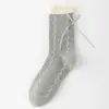 Meias de Outono e Inverno Femininas Bloqueio de Cores Azul-Cinza Meias de Cano Médio Meias Femininas Listradas Doces JK Japonesas Meias com Laço Babados para Mulheres