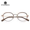 Gafas de madera STUDIOMUKU con montura redonda ovalada y diseño único, montura degradada.