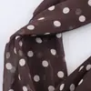 Comercio Exterior al por Mayor Ropa Nueva de Verano para Mujer Top sin Mangas Sexy con Cuello Halter Adornado de Lunares