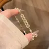 Pulsera de Cristal con Perlas y Flor de Zirconia, Sensación de Lujo Ligero y Alta Gama, Dulce y Versátil, Diseño Elegante y Único