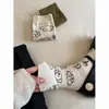 Calcetines de punta de cachorro color verde para mujer de principios de otoño, estilo casual de dibujos animados lindos japoneses, calcetines versátiles y juveniles hasta la mitad de la pantorrilla