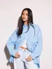 Camisa para mujer de rayas verticales azul claro, superventas transfronteriza europea y americana, con cuello camisero, hombros caídos, corte holgado, adecuada para ir al trabajo, para llevar en capas y para uso casual, camisa de manga larga