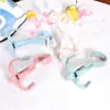 Gancho Giratório Quatro Garras Multifuncional Gancho para Bolsa de Guarda-Roupa Plástico 4 Garras Rack de Armazenamento para Lenços de Seda Gravatas Cabide Gancho