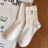 Calcetines de Oreja de Madera para Mujer Primavera y Otoño Calcetines de Media Caña Lazo Ins Moderno Simple Combinable Estudiante Casual Calcetines Apilados