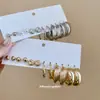Conjunto de Brincos Redondos em Formato de Coração de Metal Agulha de Prata Brincos Argola para Uso Diário Casual Design de Brincos de Nicho para Mulheres