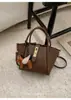 Bolsa Feminina Versátil e Fashion 2026 Nova Outono e Inverno Casual Nicho Bolsa de Mão Bolsa de Ombro Bolsa Cesta para o Dia a Dia