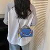 Bolso pequeño ligero y versátil de tela de nailon para mujer, nuevo bolso cruzado casual 2026, bolso para teléfono móvil exquisito y súper popular, bolso de mano pequeño