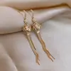 Pendientes de borla con flor de rosa de circón chapados en oro real de 14 quilates, pendientes de lujo ligero de alta gama, pendientes vintage estilo palacio