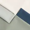 Tejido jacquard de secado rápido y alta elasticidad con patrón de piña cruzada para polos de hombre, tejido gofrado de nailon-spandex de 180g