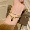 "Latido Ámbar" Ojo de Tigre Maillard Círculo Corredor Collar de Calabaza Estilo Pequeño y Fragante Cadena de Clavícula Negra y Dorada de Gama Alta para Mujeres