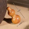 Pieza de mano de calabaza de madera para girar con los dedos, un pequeño artículo artesanal de talla de madera para alivio del estrés y entretenimiento
