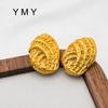 Pendientes de nicho con personalidad de moda de venta caliente transfronteriza entre Europa y Estados Unidos, pendientes de botón con patrón de pan ovalado chapados en acero de titanio y oro de 18 quilates