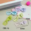 Pinza para el pelo con montura de gafas de color caramelo para niñas, linda pinza de pico de pato para flequillo y peinado del cabello suelto, accesorio de moda para el cabello de color macarrón