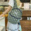 Mochila universitaria ligera de gran capacidad, estilo coreano de nicho, elegante, modelo nuevo 2026, estilo diario de lunares para mujer